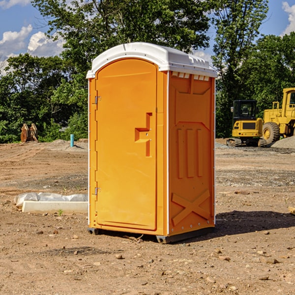 what is the cost difference between standard and deluxe portable restroom rentals in Turon